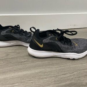 Black and white with gold feature Nike 8.5 women’s
